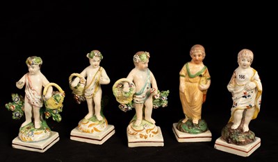 Lot 414 - Five small pearlware figures of cherubs, three...