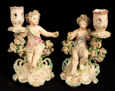 Lot 417 - A matched pair of Derby porcelain cherub...