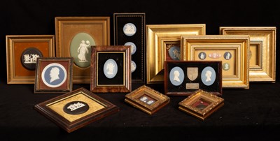 Lot 448 - Twelve frames containing Wedgwood jasperware...