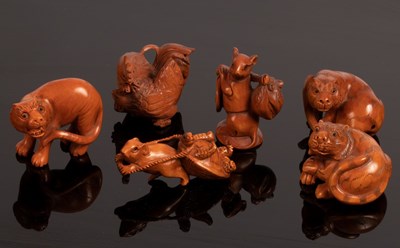 Lot 477 - Six Japanese carved boxwood netsuke, 20th...