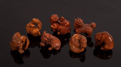 Lot 478 - Seven Japanese carved boxwood netsuke, 20th...