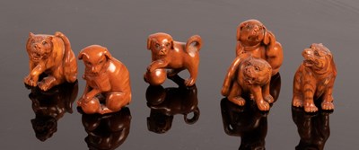 Lot 479 - Six Japanese carved boxwood netsuke, 20th...