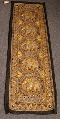 Lot 490 - An Indian embroidered wall hanging, decorated...