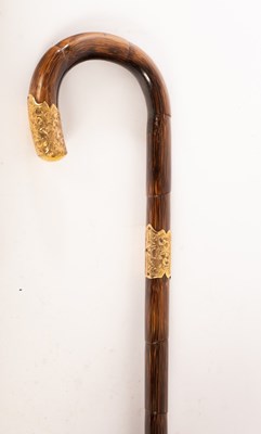 Lot 499 - An early 20th Century walking stick, with 18ct...