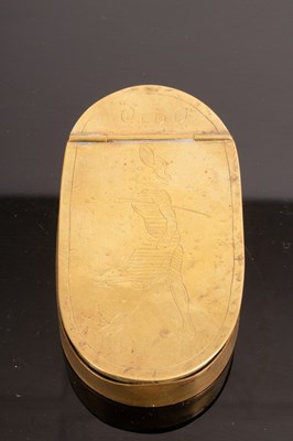 Lot 502 - An oval brass tobacco box circa 1800, the...