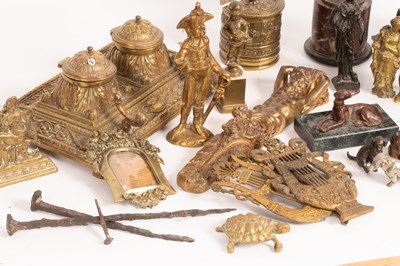 Lot 517 - A collection of decorative bronze and brass...