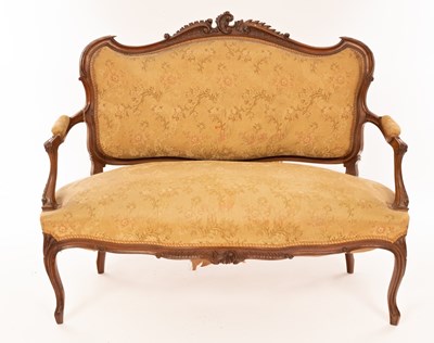 Lot 590 - A Victorian carved walnut framed settee with...