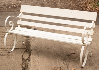 Lot 594 - A garden bench with slatted wooden seat,...