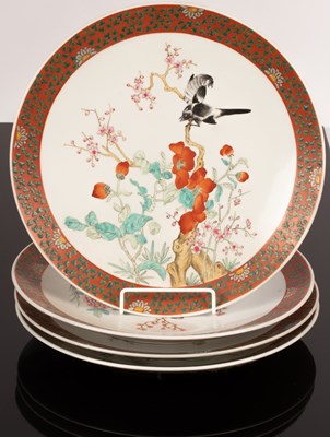 Lot 947 - A set of four Chinese porcelain cabinet plates,...