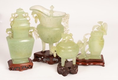 Lot 972 - Four pieces of celadon jade carving, 20th...