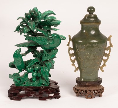 Lot 973 - A Chinese carved spinach jade vase with lotus...