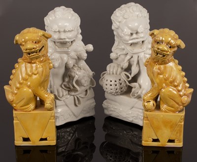 Lot 984 - Two pairs of Chinese foo dogs, 20th Century,...