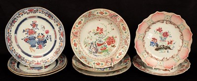 Lot 1052 - Eight Chinese famille rose plates, Qianlong...