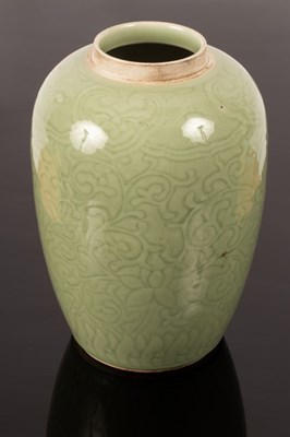 Lot 1065 - A Chinese porcelain celadon baluster vase,...