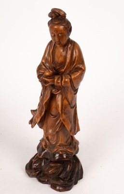 Lot 1082 - A 19th/20th Chinese Century fruitwood carving...