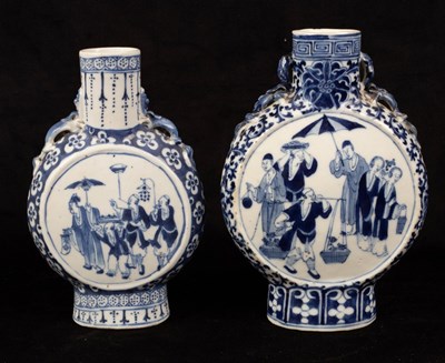 Lot 1089 - A near pair of Chinese blue and white vases,...