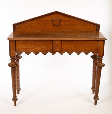 Lot 1104 - A Victorian oak hall table, with triangular...