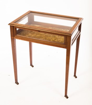 Lot 1109 - An Edwardian mahogany display case on square...