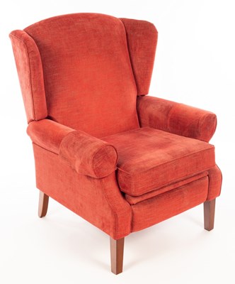 Lot 1117 - A Wesley Barrell wingback recliner armchair,...