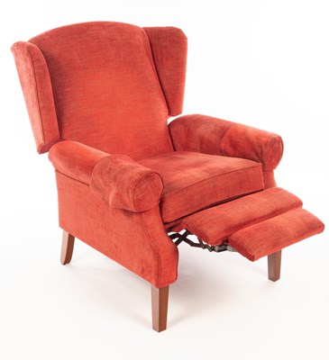 Lot 1117 - A Wesley Barrell wingback recliner armchair,...