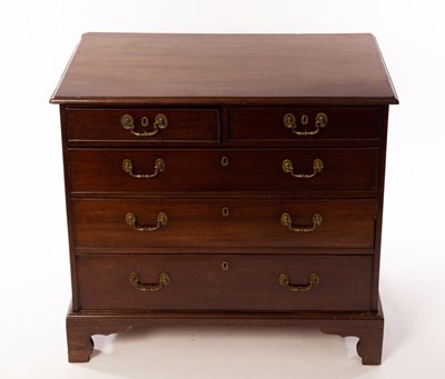 Lot 1131 - An 18th Century mahogany chest of three long...