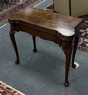 Lot 1133 - A George II mahogany tea/card table, the...