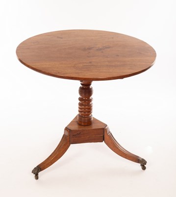 Lot 1170 - A George IV mahogany circular table, on a ring...