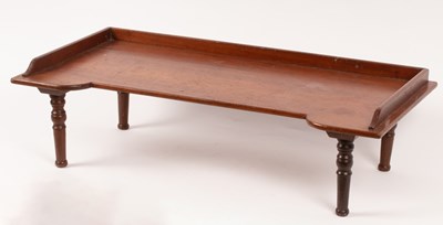 Lot 1179 - A mahogany bed tray on turned feet, 22cm x...