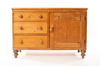 Lot 1189 - A pine dresser base fitted three short drawers...