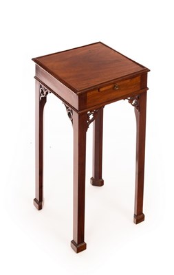 Lot 1191 - A Georgian style mahogany urn stand, the...