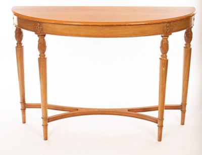 Lot 1201 - A carved beechwood console table on carved...