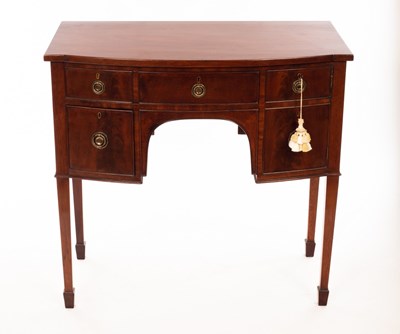 Lot 1205 - A mahogany bowfront sideboard, fitted two...