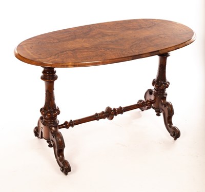 Lot 1208 - A Victorian walnut oval centre table, on...