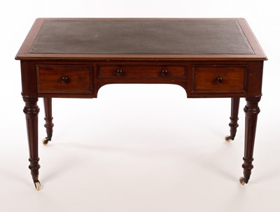 Lot 1217 - A late Victorian mahogany writing table with...