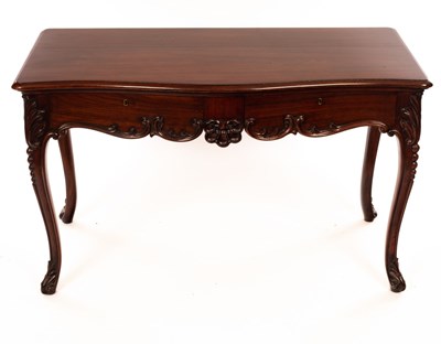 Lot 1223 - A Victorian walnut side table, the serpentine...