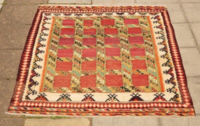 Lot 1259 - A South West Persian Qashgai Kilim rug, 235cm...