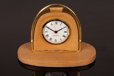 Lot 1289 - A Gucci travelling clock, the frame in the...