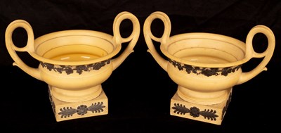 Lot 1317 - A pair of Wedgwood vases with scrolling...