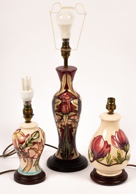 Lot 1322 - A Moorcroft pottery lamp and shade, painted...