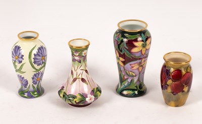 Lot 1323 - Four Moorcroft enamel vases, Blue Cornflower,...