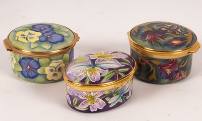 Lot 1328 - Three Moorcroft enamel boxes, Stargazer, Pansy...