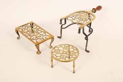 Lot 1396 - A 19th Century pierced brass and iron trivet,...