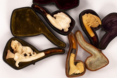 Lot 1402 - Four 19th Century Meerschaum pipes, the bowls...