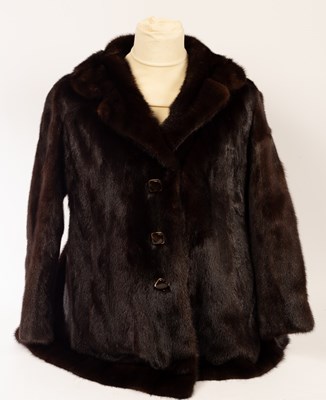 Lot 1418 - A brown fur coat by Sefton Marks of Solihull,...