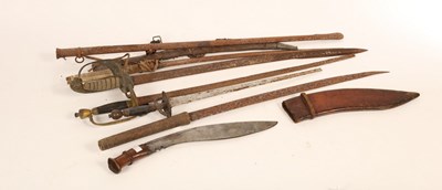 Lot 1430 - A group of six bladed weapons, to include a...