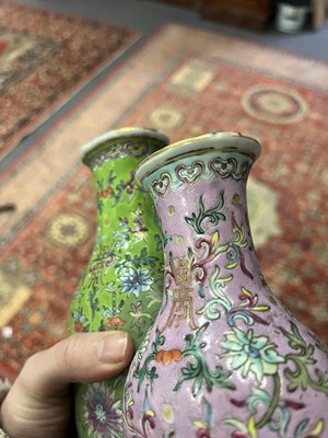 Lot 31 - A pair of famille rose conjoined vases
