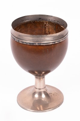 Lot 148 - A George III silver mounted coconut cup