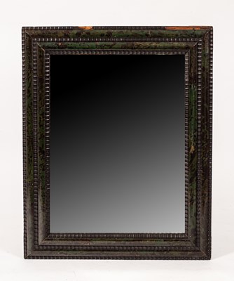 Lot 418 - A 17th Century Flemish green tortoiseshell and ripple moulded wall mirror