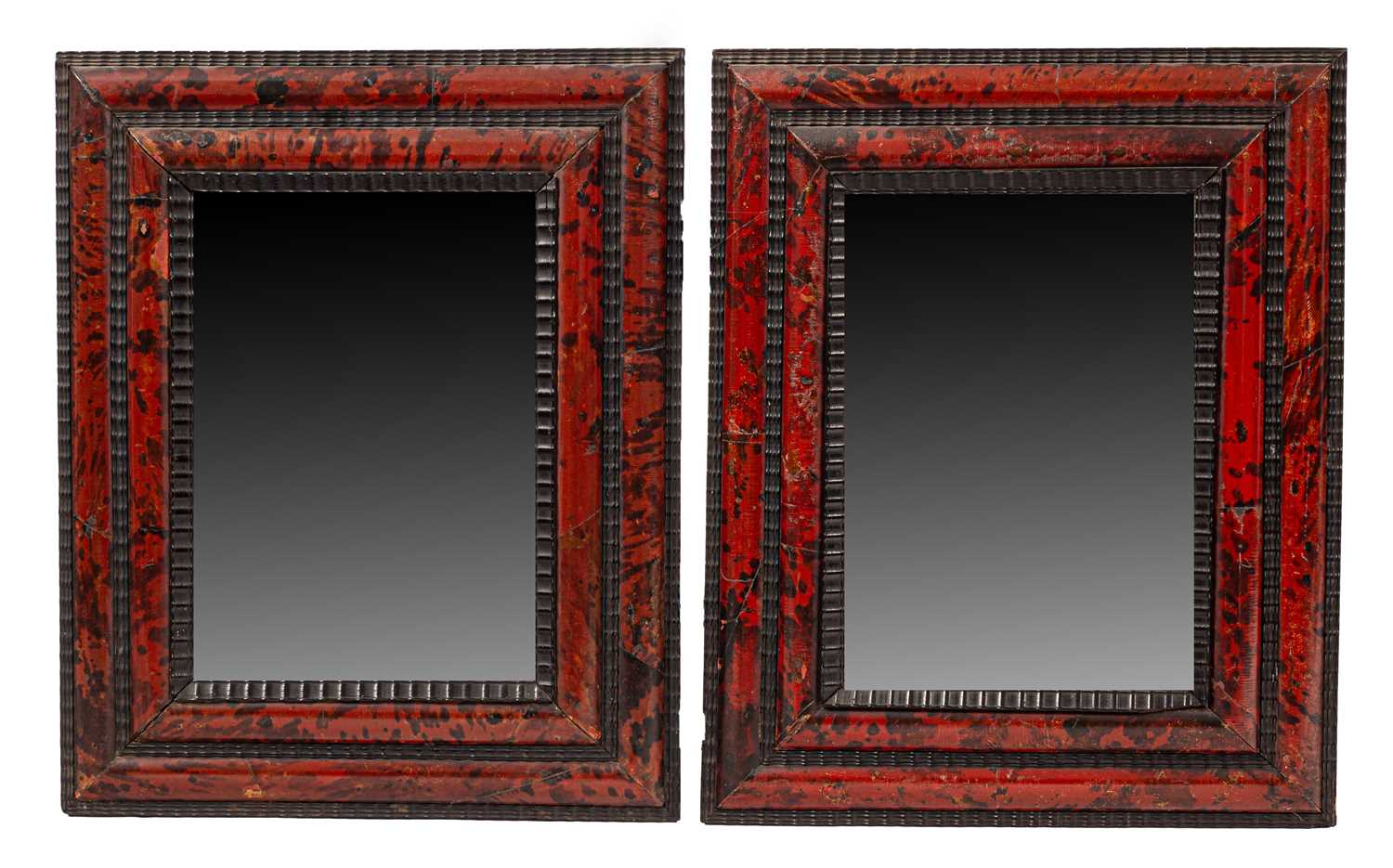 Lot 420 - A pair of Flemish tortoiseshell and ripple moulded wall mirrors