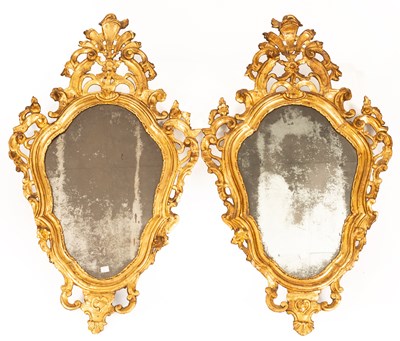 Lot 421 - A pair of Iate 18th Century Italian gilt framed cartouche-shaped mirrors